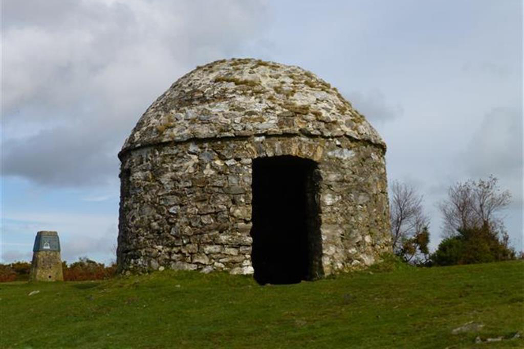 small round stone house
